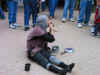 The beggar would play his horn with his nose! Thanking you for a donation! (25275 bytes)